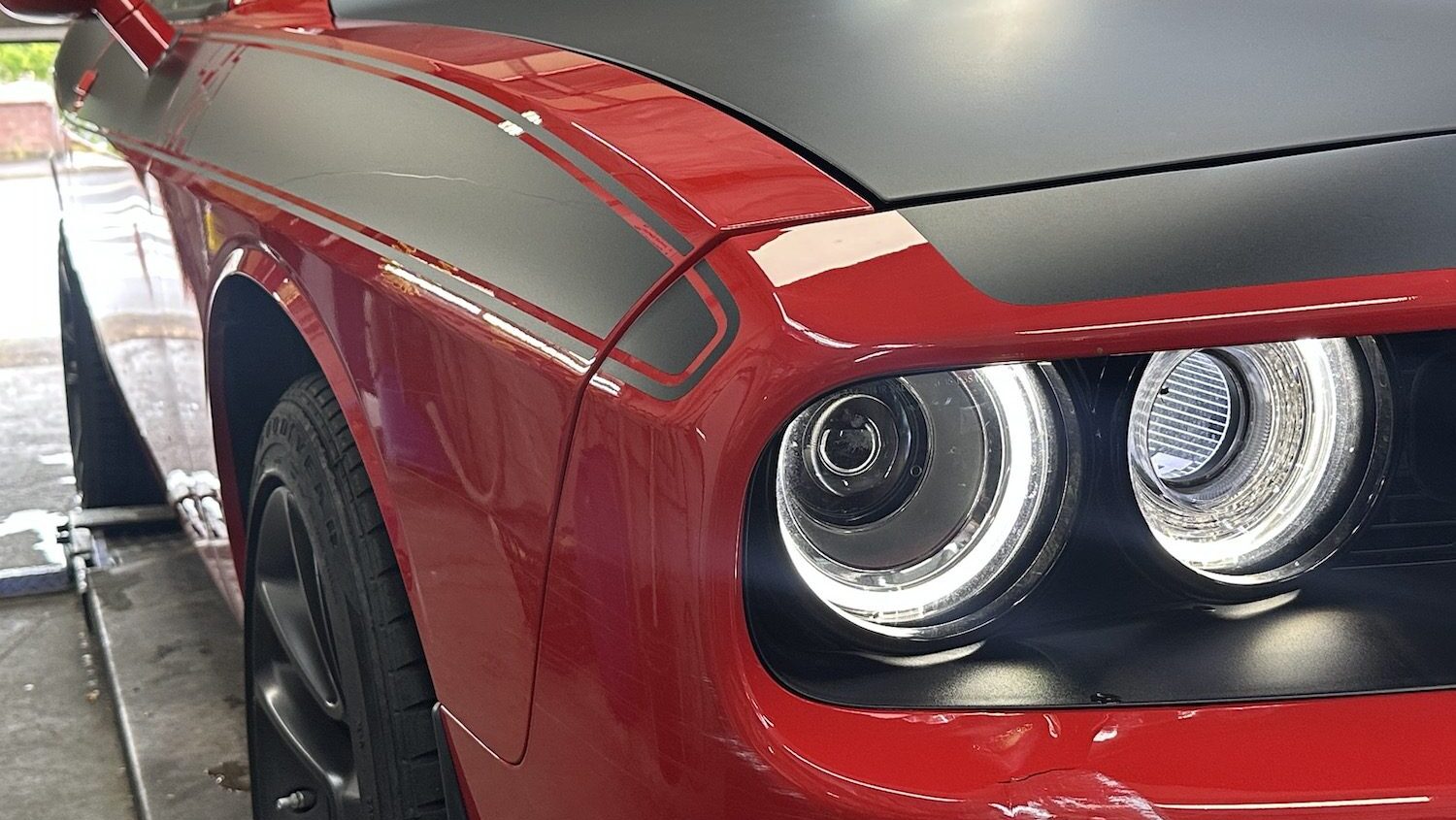 Matte paint and decals on a red car